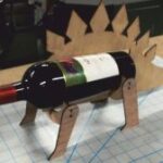 Laser Cut Stegosaurus Shaped Wine Bottle Holder Free Vector File Free Download - Dezin