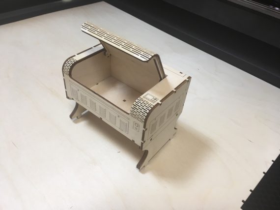 Business card holder in the form of a laser machine