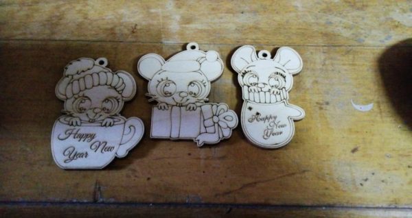 Laser Cut Happy New Year Wooden Magnets Icons Pendants Free Vector
