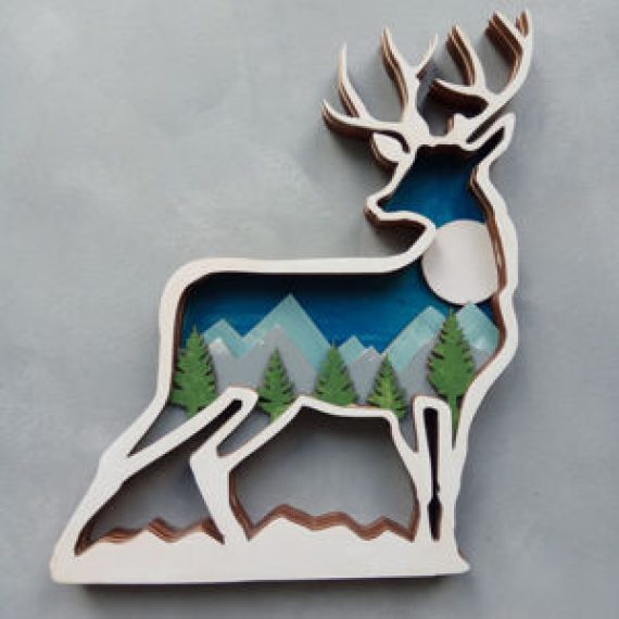 Laser cut wooden Decorative multi-layer deer panels free vector